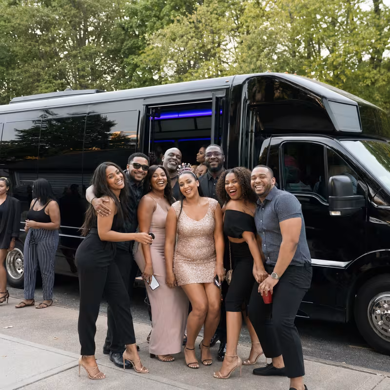 Party bus interior with wraparound leather seating and LED lighting in Fort Myers
