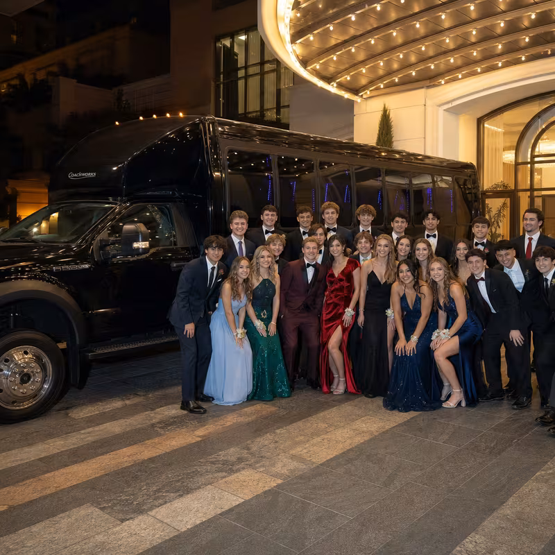 Party bus interior with wraparound leather seating and LED lighting in Fort Myers